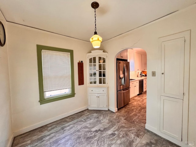 436 S Front St, Rio Vista, CA 94571 - unfurnished dining area with arched walkways and baseboards