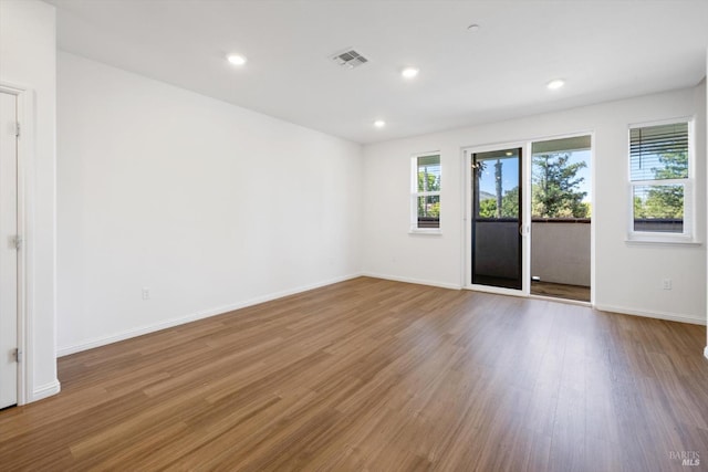 40708 Fremont Blvd, Fremont, CA 94538 - empty room with wood finished floors and recessed lighting
