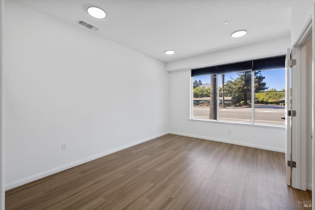 40708 Fremont Blvd, Fremont, CA 94538 - empty room with wood finished floors and recessed lighting