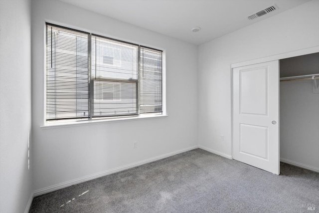 40708 Fremont Blvd, Fremont, CA 94538 - unfurnished bedroom featuring carpet floors, multiple windows, and a closet