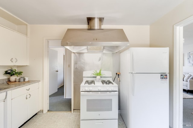 1255 Sereno Dr, Vallejo, CA 94589 - kitchen with white appliances, ventilation hood, light countertops, and white cabinetry