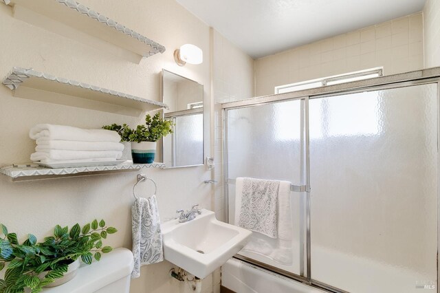 1255 Sereno Dr, Vallejo, CA 94589 - bathroom featuring toilet and shower / bath combination with glass door