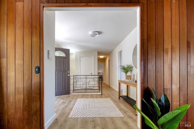 76 Oak Springs Dr, San Anselmo, CA 94960 - doorway to outside with light wood-type flooring and wooden walls