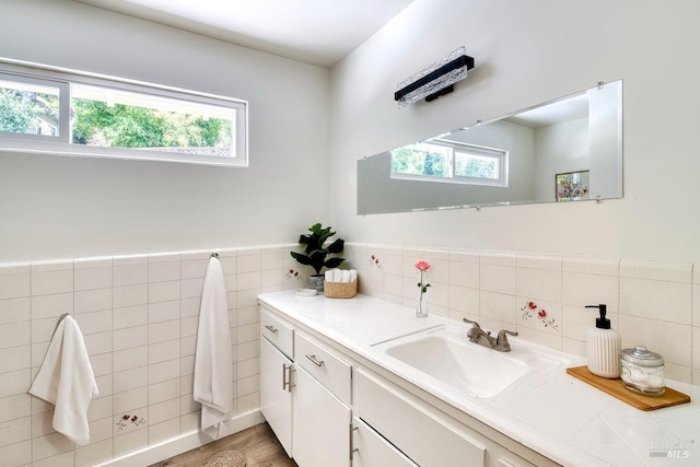 76 Oak Springs Dr, San Anselmo, CA 94960 - bathroom featuring plenty of natural light, vanity, tile walls, and wood finished floors
