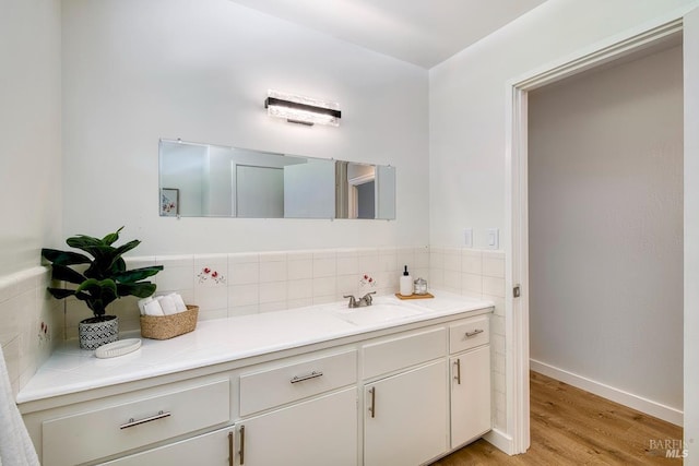 76 Oak Springs Dr, San Anselmo, CA 94960 - bathroom with decorative backsplash, vanity, and wood finished floors