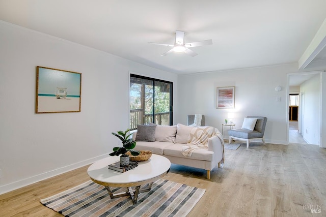 76 Oak Springs Dr, San Anselmo, CA 94960 - living area with healthy amount of natural light, light wood-style flooring, a ceiling fan, and ornamental molding
