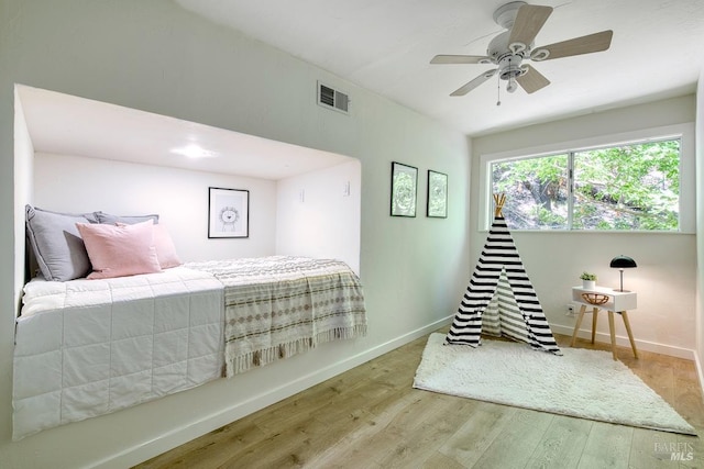 76 Oak Springs Dr, San Anselmo, CA 94960 - bedroom with wood finished floors and a ceiling fan