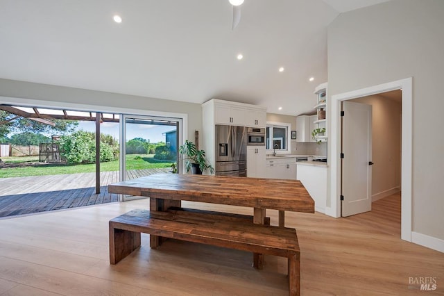 5648 Ver Ni Rd, Sebastopol, CA 95472 - dining area with light wood-type flooring, high vaulted ceiling, and recessed lighting