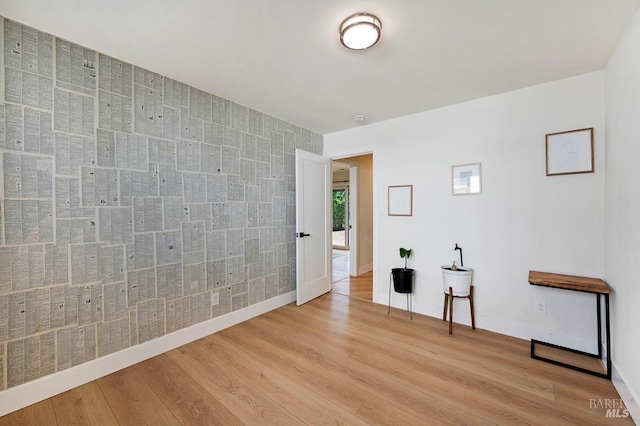 5648 Ver Ni Rd, Sebastopol, CA 95472 - spare room with light wood finished floors and an accent wall