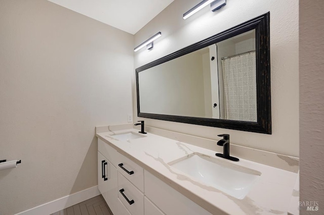 5648 Ver Ni Rd, Sebastopol, CA 95472 - bathroom with double vanity and baseboards