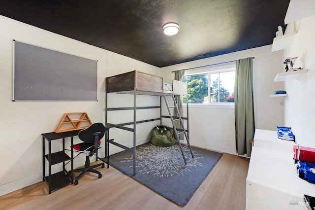 5648 Ver Ni Rd, Sebastopol, CA 95472 - bedroom with wood finished floors and baseboards