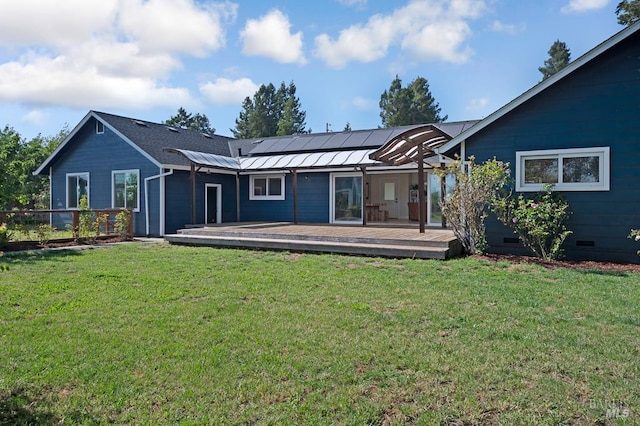 5648 Ver Ni Rd, Sebastopol, CA 95472 - rear view of house featuring roof mounted solar panels, crawl space, a lawn, and a deck