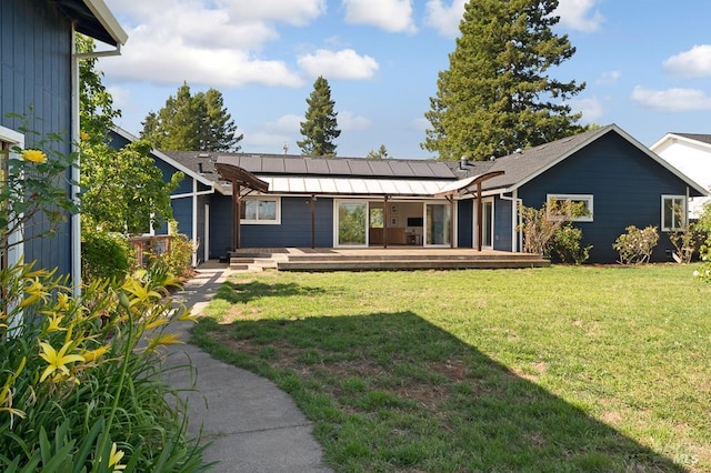 5648 Ver Ni Rd, Sebastopol, CA 95472 - rear view of house with roof mounted solar panels and a yard