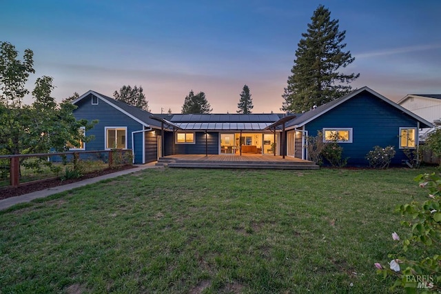 5648 Ver Ni Rd, Sebastopol, CA 95472 - back of house at dusk with solar panels and a deck