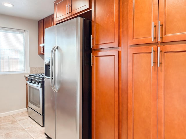 1930 Benita Dr Unit 2, Rancho Cordova, CA 95670 - kitchen featuring stainless steel appliances, light tile patterned flooring, recessed lighting, and brown cabinets