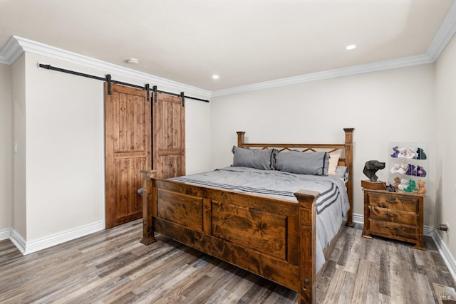 875 White Cottage Rd N, Angwin, CA 94508 - bedroom with a barn door, light wood-style flooring, crown molding, and recessed lighting
