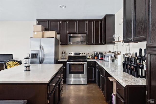 875 White Cottage Rd N, Angwin, CA 94508 - kitchen featuring appliances with stainless steel finishes, a center island, dark brown cabinetry, finished concrete flooring, and recessed lighting
