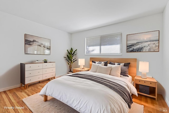 437 Ely Blvd S, Petaluma, CA 94954 - bedroom with light wood-type flooring and baseboards