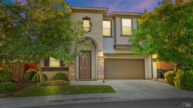 5041 Soprano Cir, Fairfield, CA 94534 - mediterranean / spanish house with an attached garage, stucco siding, driveway, and stone siding