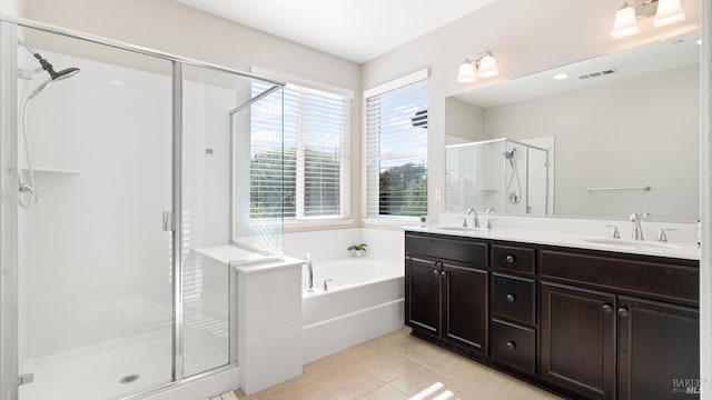 5041 Soprano Cir, Fairfield, CA 94534 - full bathroom featuring a stall shower, a bath, double vanity, and tile patterned floors