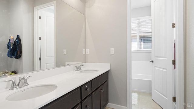 5041 Soprano Cir, Fairfield, CA 94534 - bathroom with double vanity, a bath, and tile patterned floors