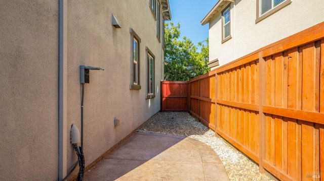 5041 Soprano Cir, Fairfield, CA 94534 - view of side of property featuring stucco siding and a patio area