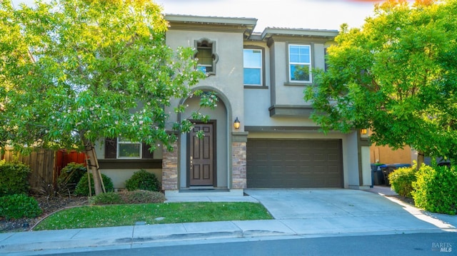 5041 Soprano Cir, Fairfield, CA 94534 - view of front of house featuring stucco siding, a garage, concrete driveway, and stone siding