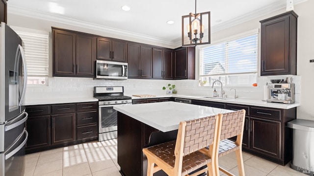 5041 Soprano Cir, Fairfield, CA 94534 - kitchen with stainless steel appliances, light countertops, decorative backsplash, light tile patterned floors, and dark brown cabinets
