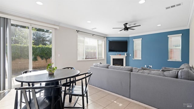 5041 Soprano Cir, Fairfield, CA 94534 - living room featuring light tile patterned flooring, ceiling fan, a fireplace, crown molding, and recessed lighting