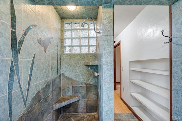 3100 Radical Ridge Rd, Redwood Valley, CA 95470 - full bathroom featuring tiled shower, wood finished floors, and built in shelves