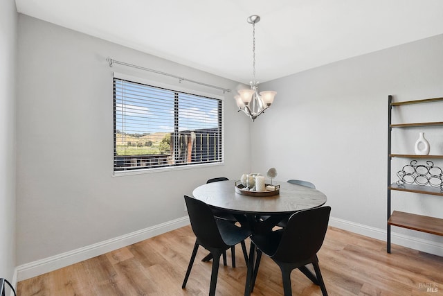 900 Cambridge Dr Unit 77, Benicia, CA 94510 - dining space with light wood finished floors and a chandelier