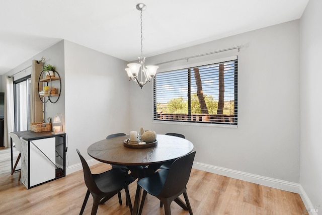 900 Cambridge Dr Unit 77, Benicia, CA 94510 - dining room with light wood-type flooring and a chandelier