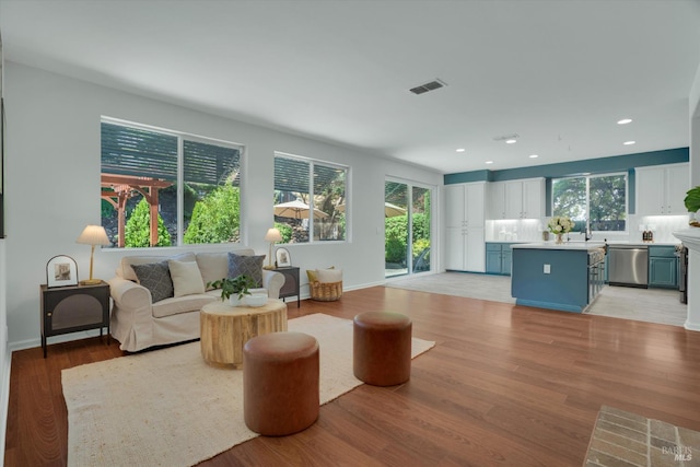 494 Mccall Dr, Benicia, CA 94510 - living area featuring light wood-style floors, plenty of natural light, and recessed lighting