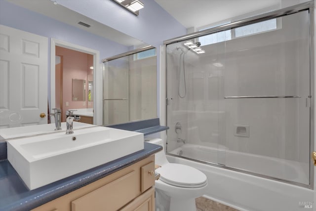494 Mccall Dr, Benicia, CA 94510 - bathroom featuring vanity, combined bath / shower with glass door, and healthy amount of natural light