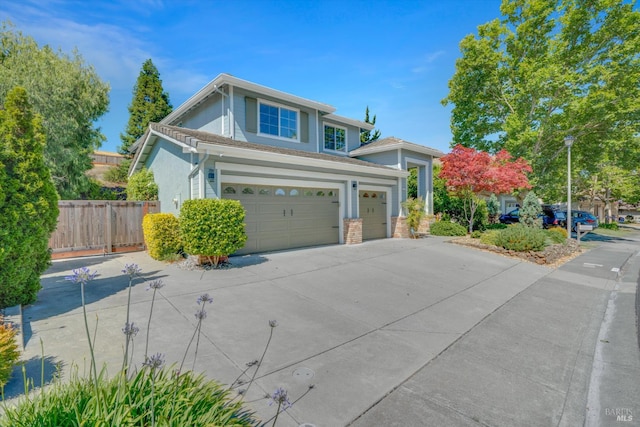 494 Mccall Dr, Benicia, CA 94510 - traditional home featuring concrete driveway, a garage, and stucco siding
