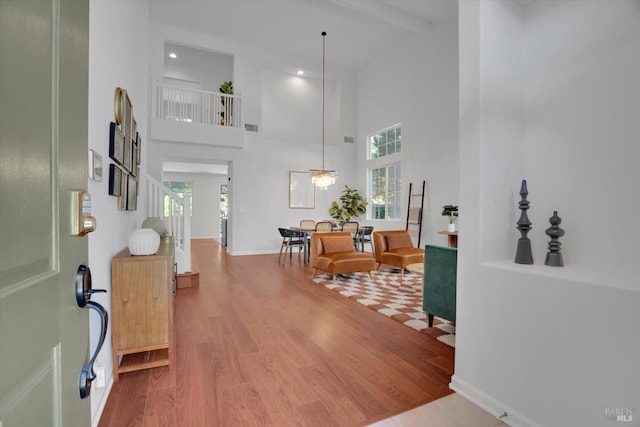 494 Mccall Dr, Benicia, CA 94510 - foyer with high vaulted ceiling, wood finished floors, beam ceiling, and recessed lighting