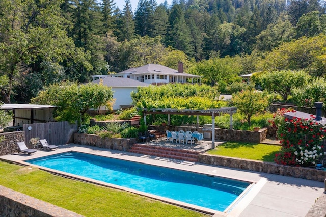 1300 Ink Grade Rd, Pope Valley, CA 94567 - swimming pool with a forest view, a patio area, and a pergola