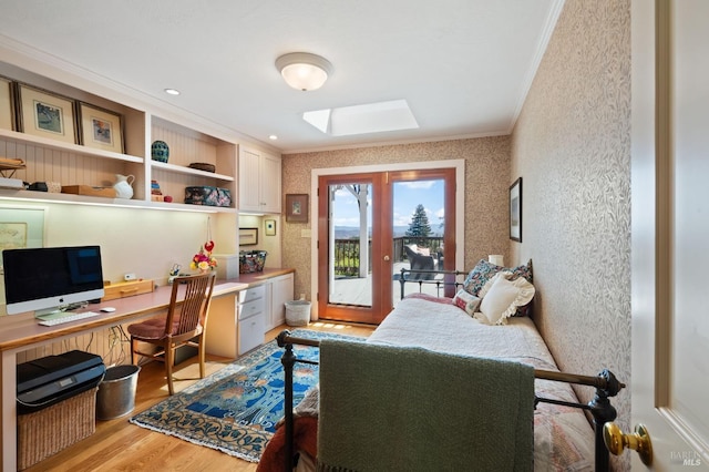 1300 Ink Grade Rd, Pope Valley, CA 94567 - bedroom featuring ornamental molding, built in study area, light wood finished floors, a skylight, and access to outside