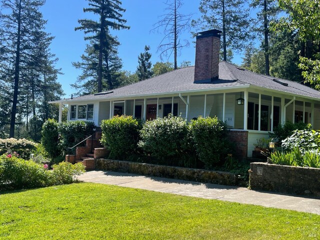 1300 Ink Grade Rd, Pope Valley, CA 94567 - view of front of house with a front yard and a chimney