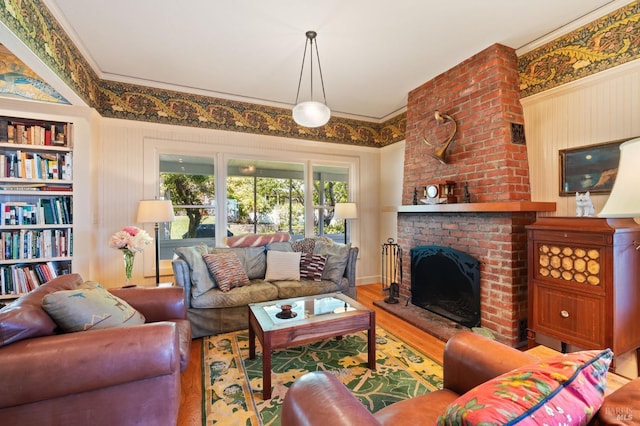 1300 Ink Grade Rd, Pope Valley, CA 94567 - living area with wood finished floors, a brick fireplace, and ornamental molding