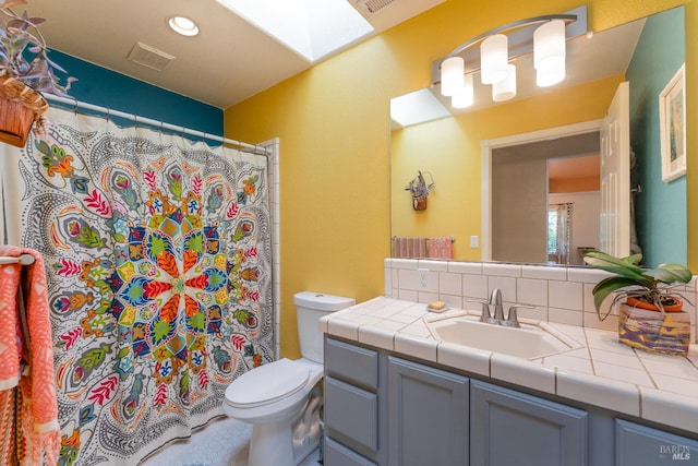 1851 Daniel Way, Redwood Valley, CA 95470 - bathroom featuring vanity, a skylight, and a shower with shower curtain