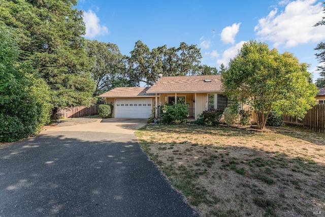 1851 Daniel Way, Redwood Valley, CA 95470 - view of front facade with asphalt driveway and a garage