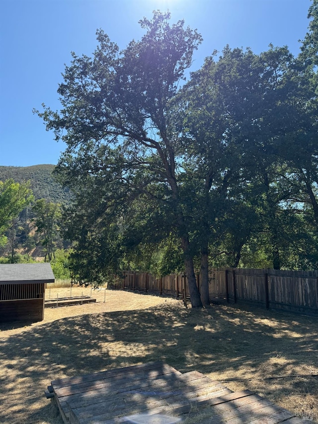 1803 New Long Valley Rd, Clearlake Oaks, CA 95423 - view of yard with an outbuilding