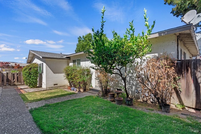434 E H St, Benicia, CA 94510 - view of property exterior with stucco siding and crawl space