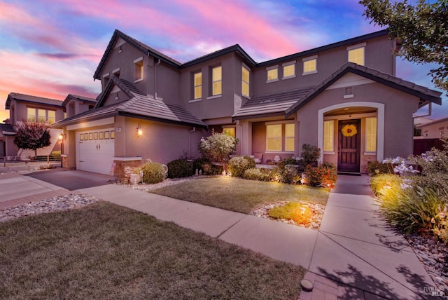 644 Canterbury Cir, Vacaville, CA 95687 - traditional-style house with stucco siding, a tiled roof, concrete driveway, and a front lawn