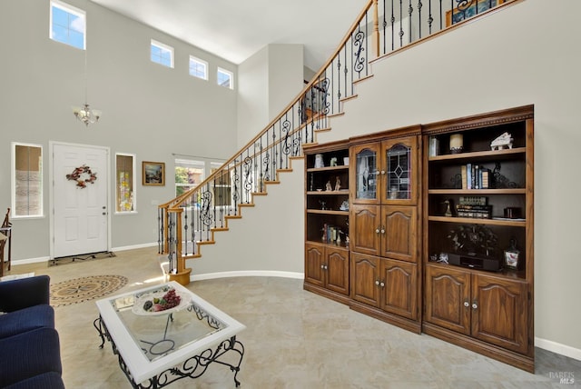 644 Canterbury Cir, Vacaville, CA 95687 - living room featuring healthy amount of natural light, stairway, and a high ceiling
