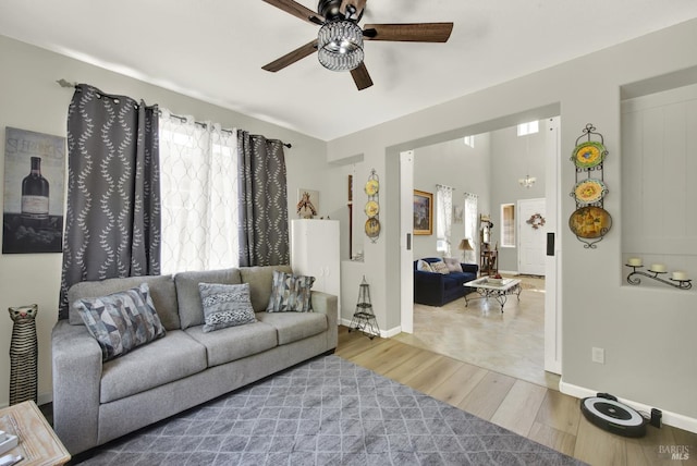 644 Canterbury Cir, Vacaville, CA 95687 - living room with wood finished floors and a ceiling fan