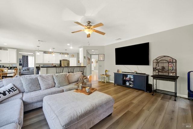644 Canterbury Cir, Vacaville, CA 95687 - living room featuring ceiling fan, light wood-style floors, and recessed lighting