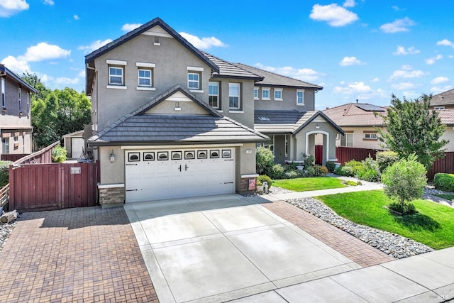 644 Canterbury Cir, Vacaville, CA 95687 - view of front of property featuring stucco siding, concrete driveway, and a tile roof