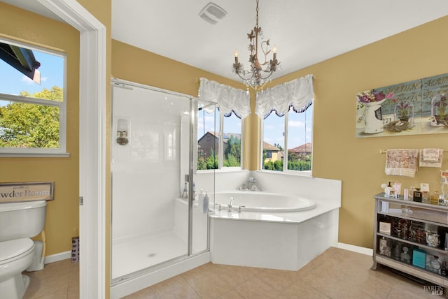 644 Canterbury Cir, Vacaville, CA 95687 - bathroom featuring a chandelier, a stall shower, a garden tub, and tile patterned floors